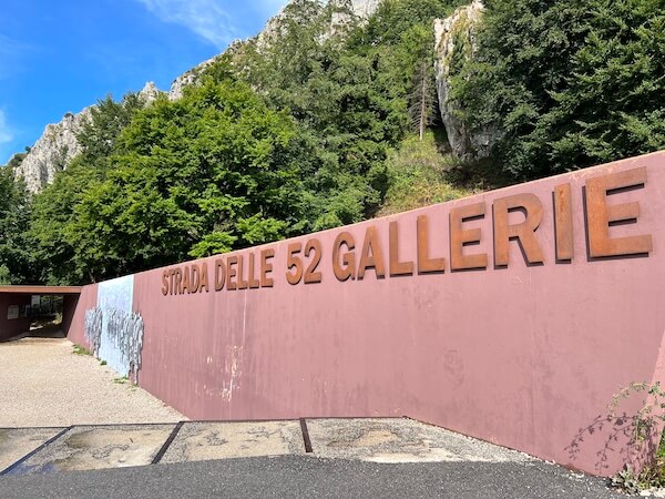 Entrance to Strada delle 52 Gallerie at the parking lot