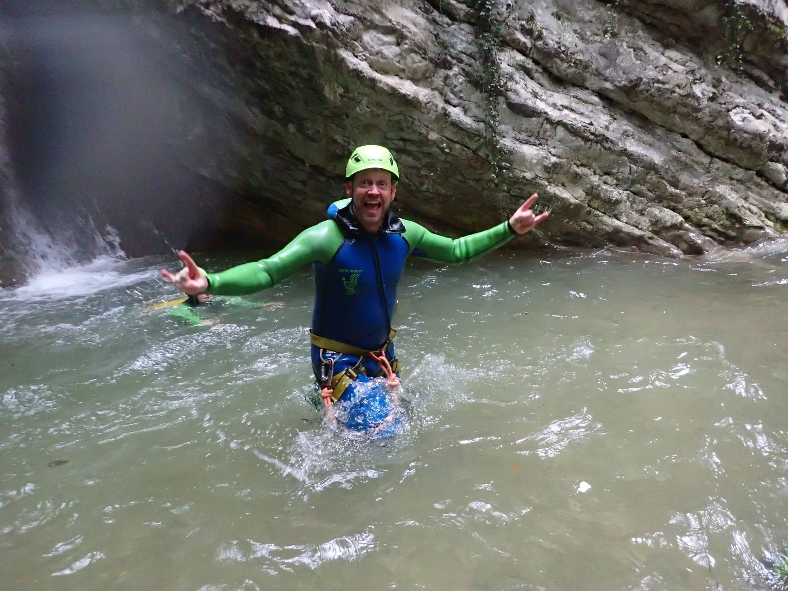 Andy Canyoning standing in the water